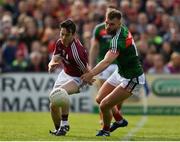 13 May 2018; Ian Burke of Galway in action against Aidan O'Shea of Mayo during the Connacht GAA Football Senior Championship Quarter-Final match between Mayo and Galway at Elvery's MacHale Park in Mayo. Photo by Eóin Noonan/Sportsfile