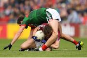 13 May 2018; (EDITORS NOTE; This image contains graphic content) Tom Parsons of Mayo during a coming together with Eoghan Kerin of Galway during the Connacht GAA Football Senior Championship Quarter-Final match between Mayo and Galway at Elvery's MacHale Park in Mayo. Photo by Eóin Noonan/Sportsfile