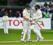 14 May 2018; Stuart Thompson of Ireland, right, is congratulated by team-mate Kevin O'Brien, left, after scoring a half-century during day four of the International Cricket Test match between Ireland and Pakistan at Malahide, in Co. Dublin. Photo by Seb Daly/Sportsfile