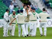 15 May 2018; Ed Joyce of Ireland, second right, celebrates with team-mates after catching out Haris Sohail of Pakistan, off of a Boyd Rankin delivery, during day five of the International Cricket Test match between Ireland and Pakistan at Malahide, in Co. Dublin. Photo by Seb Daly/Sportsfile