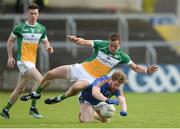 13 May 2018; Kevin Murphy of Wicklow in action against Conor Carroll and Conor McNamee of Offaly, left, during the Leinster GAA Football Senior Championship Preliminary Round match between Offaly and Wicklow at O'Moore Park in Laois. Photo by Piaras Ó Mídheach/Sportsfile