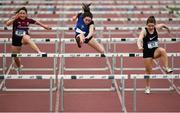 17 May 2018; Aoibhe Deeley of St Killians New Inn, Co. Galway, left, with Saoirse Wynn of Abbey Community College, Co. Roscommon and Cian Burke of Ballyhaunis Community School, Co. Mayo competing in the Inter Girls 80m Hurdles event during the Irish Life Health Connacht Schools Track and Field event at Athlone I.T., Athlone, Co. Westmeath. Photo by Harry Murphy/Sportsfile
