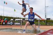 19 May 2018; James McGuire, front, of St Flannan's, Co. Clare, and Fergus O'Brien of Gaelcholáiste Phort Láirge, Co. Waterford, competing in the Senior Boys 2000m Steeplechase event  at the Irish Life Health Munster Schools Track and Field Championships at Crageens in Castleisland, Co Kerry. Photo by Harry Murphy/Sportsfile