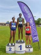 19 May 2018; The Inter Girls 200m podium, winner, Rhasidat Adeleke of Presentation Terenure, Co Dublin, centre, second place, Patience Jumbo-Gula of St Vincent's Dundalk, Co Louth, left, and third place Carla Hudson of Wesley College, Co Dublin, right, during Day Two of the Irish Life Health Leinster Schools Track and Field Championships at Morton Stadium in Santry, Dublin. Photo by David Fitzgerald/Sportsfile