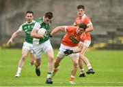 19 May 2018; Ryan Jones of Fermanagh in action against Patrick Burns of Armagh during the Ulster GAA Football Senior Championship Quarter-Final match between Fermanagh and Armagh at Brewster Park in Enniskillen, Fermanagh. Photo by Oliver McVeigh/Sportsfile