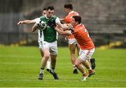 19 May 2018; Ryan Jones of Fermanagh in action against Patrick Burns of Armagh during the Ulster GAA Football Senior Championship Quarter-Final match between Fermanagh and Armagh at Brewster Park in Enniskillen, Fermanagh. Photo by Oliver McVeigh/Sportsfile