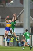 19 May 2018; Cathal O'Connor of Clare in action against Darragh Treacy and Michael Fitzgibbon, right, of Limerick during the Munster GAA Football Senior Championship Quarter-Final match between Limerick and Clare at the Gaelic Grounds in Limerick. Photo by Piaras Ó Mídheach/Sportsfile