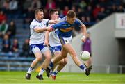 19 May 2018; Liam Casey of Tipperary in action against James McGrath, left, and Conor Murray of Waterford during the Munster GAA Football Senior Championship Quarter-Final match between Tipperary and Waterford at Semple Stadium in Thurles, Co Tipperary. Photo by Daire Brennan/Sportsfile