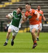 19 May 2018; Declan McCusker of Fermanagh in action against Mark Shields of Armagh during the Ulster GAA Football Senior Championship Quarter-Final match between Fermanagh and Armagh at Brewster Park in Enniskillen, Fermanagh. Photo by Oliver McVeigh/Sportsfile
