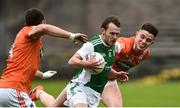 19 May 2018; Declan McCusker of Fermanagh in action against Brendan Donaghy, left, and Ben Crealey of Armagh during the Ulster GAA Football Senior Championship Quarter-Final match between Fermanagh and Armagh at Brewster Park in Enniskillen, Fermanagh. Photo by Oliver McVeigh/Sportsfile