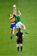 19 May 2018; Gary Brennan of Clare contests the throw-in at the start of the second half against Darragh Treacy, front, and Michael Fitzgibbon of Limerick during the Munster GAA Football Senior Championship Quarter-Final match between Limerick and Clare at the Gaelic Grounds in Limerick. Photo by Piaras Ó Mídheach/Sportsfile