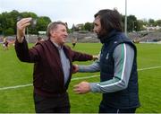 19 May 2018; Fr Brian Darcy congratulates Fermanagh assistant manager Ryan McMenamin after the Ulster GAA Football Senior Championship Quarter-Final match between Fermanagh and Armagh at Brewster Park in Enniskillen, Fermanagh. Photo by Oliver McVeigh/Sportsfile