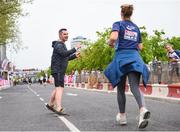 20 May 2018; Personal trainer Karl Henry urges on runners during the SPAR Streets of Dublin 5K at the CHQ Building in Dublin. Photo by David Fitzgerald/Sportsfile