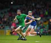 20 May 2018; Padraig Harnett of Limerick in action against James Devanney of Tipperary during the Electric Ireland Munster GAA Hurling Minor Championship Round 1 match between Limerick and Tipperary at the Gaelic Grounds in Limerick. Photo by Ray McManus/Sportsfile