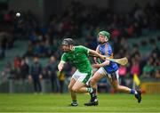 20 May 2018; Padraig Harnett of Limerick in action against James Devanney of Tipperary during the Electric Ireland Munster GAA Hurling Minor Championship Round 1 match between Limerick and Tipperary at the Gaelic Grounds in Limerick. Photo by Ray McManus/Sportsfile