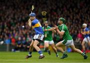 20 May 2018; Sean Finn of Limerick dives in to block a shot by John McGrath of Tipperary during the Munster GAA Hurling Senior Championship Round 1 match between Limerick and Tipperary at the Gaelic Grounds in Limerick. Photo by Ray McManus/Sportsfile