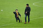 20 May 2018; Wexford supporters Tom Murphy and his son David, aged 9, from Fethard, Co Wexford, make their way across the pitch ahead of the Leinster GAA Hurling Senior Championship Round 2 match between Wexford and Dublin at Innovate Wexford Park in Wexford. Photo by Daire Brennan/Sportsfile