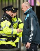 20 May 2018; Dublin manager Pat Gilroy speaks to a member of An Garda Síochána, who informed him that the game would be delayed for 15 minutes due to traffic congestion approaching the ground ahead of the Leinster GAA Hurling Senior Championship Round 2 match between Wexford and Dublin at Innovate Wexford Park in Wexford. Photo by Daire Brennan/Sportsfile