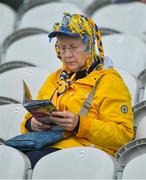 20 May 2018; A Clare supporter reads her match programme prior to the Munster GAA Hurling Senior Championship Round 1 match between Cork and Clare at Páirc Uí Chaoimh in Cork. Photo by Brendan Moran/Sportsfile