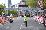 20 May 2018; Dan Tanui crosses the finish line to win the SPAR Streets of Dublin 5K at the CHQ Building in Dublin. Photo by David Fitzgerald/Sportsfile