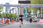 20 May 2018; Joseph O'Donoghue crosses the line to finish third during the SPAR Streets of Dublin 5K at the CHQ Building in Dublin. Photo by David Fitzgerald/Sportsfile