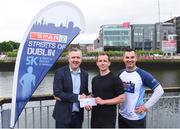 20 May 2018; Third place, Joseph O'Donoghue, centre, with Spar Sales Director Colin Donnelly, left, and personal trainer Karl Henry the SPAR Streets of Dublin 5K at the CHQ Building in Dublin. Photo by David Fitzgerald/Sportsfile