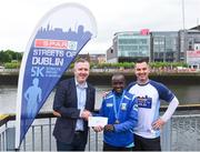 20 May 2018; Second place, Peter Somba, centre, with Spar Sales Director Colin Donnelly, left, and personal trainer Karl Henry the SPAR Streets of Dublin 5K at the CHQ Building in Dublin. Photo by David Fitzgerald/Sportsfile