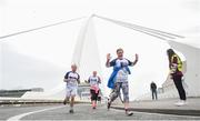 20 May 2018; Denise Behan, right, Tobias Burns, left, and Carol Landy during the SPAR Streets of Dublin 5K at the CHQ Building in Dublin. Photo by David Fitzgerald/Sportsfile