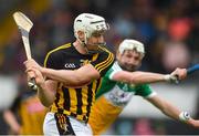 20 May 2018; Liam Blanchfield of Kilkenny shoots to score his side's second goal as Dermott Shortt of Offaly closes in during the Leinster GAA Hurling Senior Championship Round 2 match between Kilkenny and Offaly at Nowlan Park in Kilkenny. Photo by Piaras Ó Mídheach/Sportsfile