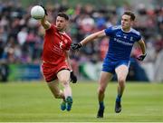 20 May 2018; Matthew Donnelly of Tyrone  in action against Niall Kearns of Monaghan during the Ulster GAA Football Senior Championship Quarter-Final match between Tyrone and Monaghan at Healy Park in Tyrone. Photo by Oliver McVeigh/Sportsfile