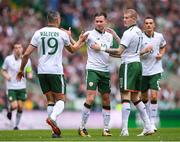 20 May 2018; Alan Browne, centre, is congratulated by his Republic of Ireland XI team-mates Jonathan Walters, left, and James McClean, right, after scoring his side's first goal during Scott Brown's testimonial match between Celtic and Republic of Ireland XI at Celtic Park in Glasgow, Scotland. Photo by Stephen McCarthy/Sportsfile