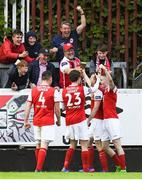 25 May 2018; Conan Byrne of St Patrick's Athletic celebrates after scoring his side's first goal with supporters and team mates during the SSE Airtricity League Premier Division match between St Patrick's Athletic and Cork City at Richmond Park in Dublin. Photo by David Fitzgerald/Sportsfile