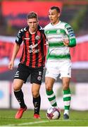 25 May 2018; Graham Burke of Shamrock Rovers in action against Oscar Brennan of Bohemians during the SSE Airtricity League Premier Division match between Bohemians and Shamrock Rovers at Dalymount Park in Dublin. Photo by Stephen McCarthy/Sportsfile