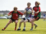 26 May 2018; Sinead Deeagn of AIB, Dublin, in action against Niamh Breen, left, and Maura Reid of St Kevins Community College, Co. Wicklow, during the LGFA Interfirms Blitz 2018 at Naomh Mearnóg GAA Club, Portmarnock, Dublin. This year seven companies competed for the top prize, while nine teams signed up to take part in a recreational blitz. Photo by Seb Daly/Sportsfile