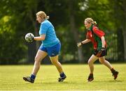 26 May 2018; Maire Doyle of University Hospital Waterford in action against Carol Breen of St Kevins Community College, Co. Wicklow, during the LGFA Interfirms Blitz 2018 at Naomh Mearnóg GAA Club, Portmarnock, Dublin. This year seven companies competed for the top prize, while nine teams signed up to take part in a recreational blitz. Photo by Seb Daly/Sportsfile