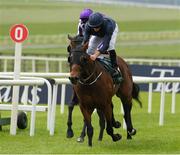 26 May 2018; Merchant Navy, with Ryan Moore up, on their way to winning The Weatherbys Ireland Greenlands Stakes from Spirit of Valor, on the rails, during the Curragh Races Irish 2000 Guineas Day at the Curragh in Kildare. Photo by Ray McManus/Sportsfile