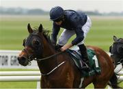 26 May 2018; Merchant Navy, with Ryan Moore up, on their way to winning The Weatherbys Ireland Greenlands Stakes during the Curragh Races Irish 2000 Guineas Day at the Curragh in Kildare. Photo by Ray McManus/Sportsfile