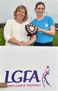 26 May 2018; Áine Ní Mhéalóid of University Hospital Waterford is presented with the shield by Ladies Gaelic Football Association President, Marie Hickey, following her side's victory during the LGFA Interfirms Blitz 2018 at Naomh Mearnóg GAA Club, Portmarnock, Dublin. This year seven companies competed for the top prize, while nine teams signed up to take part in a recreational blitz. Photo by Seb Daly/Sportsfile