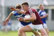 26 May 2018; Ger Egan of Westmeath in action against Trevor Collins of Laois during the Leinster GAA Football Senior Championship Quarter-Final match between Laois and Westmeath at Bord na Mona O'Connor Park in Tullamore, Offaly. Photo by Matt Browne/Sportsfile