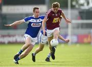 26 May 2018; Luke Loughlin of Westmeath in action against Paul Kingston and Trevor Collins of Laois during the Leinster GAA Football Senior Championship Quarter-Final match between Laois and Westmeath at Bord na Mona O'Connor Park in Tullamore, Offaly. Photo by Matt Browne/Sportsfile