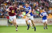 26 May 2018; John O'Loughlin of Laois  in action against Darragh Daly of Westmeath during the Leinster GAA Football Senior Championship Quarter-Final match between Laois and Westmeath at Bord na Mona O'Connor Park in Tullamore, Offaly. Photo by Matt Browne/Sportsfile