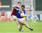 26 May 2018; Ross Munnelly of Laois in action against Jamie Gonoud of Westmeath during the Leinster GAA Football Senior Championship Quarter-Final match between Laois and Westmeath at Bord na Mona O'Connor Park in Tullamore, Offaly. Photo by Matt Browne/Sportsfile