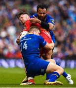 26 May 2018; Steff Evans of Scarlets is tackled by Jordan Larmour and Isa Nacewa of Leinster during the Guinness PRO14 Final between Leinster and Scarlets at the Aviva Stadium in Dublin. Photo by David Fitzgerald/Sportsfile