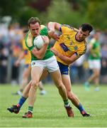 26 May 2018; Michael McWeeney of Leitrim in action against Tadhg O'Rourke of Roscommon during the Connacht GAA Football Senior Championship semi-final match between Leitrim and Roscommon at Páirc Seán Mac Diarmada in Carrick-on-Shannon, Leitrim. Photo by Piaras Ó Mídheach/Sportsfile