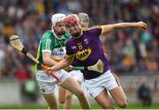 26 May 2018; Paul Morris of Wexford in action against Paddy Delaney of Offaly during the Leinster GAA Hurling Senior Championship Round 3 match between Offaly and Wexford at Bord na Mona O'Connor Park in Tullamore, Offaly. Photo by Matt Browne/Sportsfile
