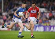 26 May 2018; Michael Quinlivan of Tipperary in action against Jamie O'Sullivan of Cork during the Munster GAA Football Senior Championship semi-final match between Tipperary and Cork at Semple Stadium in Thurles, County Tipperary. Photo by Eóin Noonan/Sportsfile