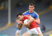 26 May 2018; Stephen Cronin of Cork in action against Conor Sweeney of Tipperary during the Munster GAA Football Senior Championship semi-final match between Tipperary and Cork at Semple Stadium in Thurles, County Tipperary. Photo by Eóin Noonan/Sportsfile