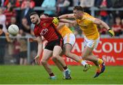 26 May 2018; Connaire Harrison of Down  in action against Patrick Gallagher and Mark Sweeney of Antrim during the Ulster GAA Football Senior Championship Quarter-Final match between Down and Antrim at Pairc Esler in Newry, Down. Photo by Oliver McVeigh/Sportsfile