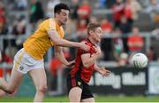 26 May 2018; Caolan Mooney of Down  in action against Niall McKeever of Antrim during the Ulster GAA Football Senior Championship Quarter-Final match between Down and Antrim at Pairc Esler in Newry, Down. Photo by Oliver McVeigh/Sportsfile