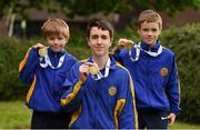 26 May 2018; The Leahy brothers, Morgan, aged 9, Jack aged 14, and Shane, aged 11, from Cratloe, Co. Clare, with their three gold medals after each won their respective Model Making event during day 1 of the Aldi Community Games. Over 3,500 children took part in Aldi Community Games May Festival on a sun-drenched, fun-filled weekend in University of Limerick from 26th to 27th May. Photo by Diarmuid Greene/Sportsfile
